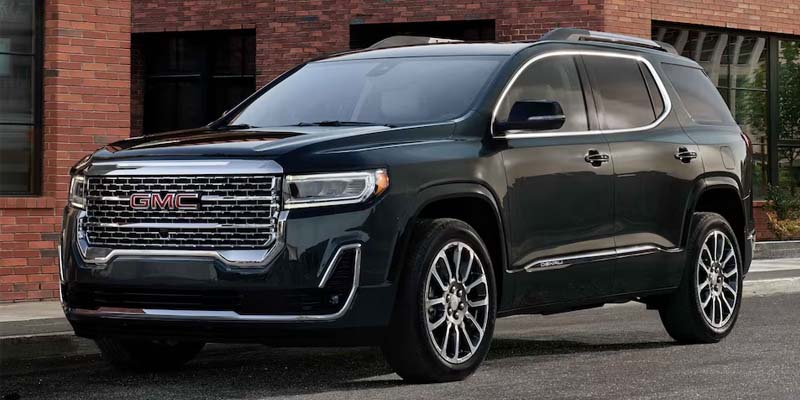 dark green 2023 GMC Acadia 
